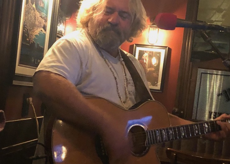 Catfish Hunter, a South Florida guitar player, performing live at a bar